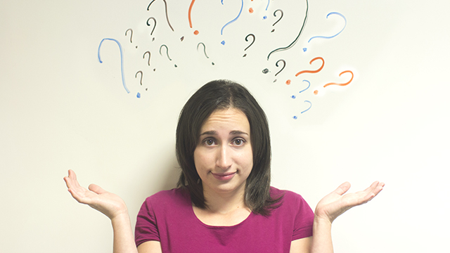 Question marks around lady's head