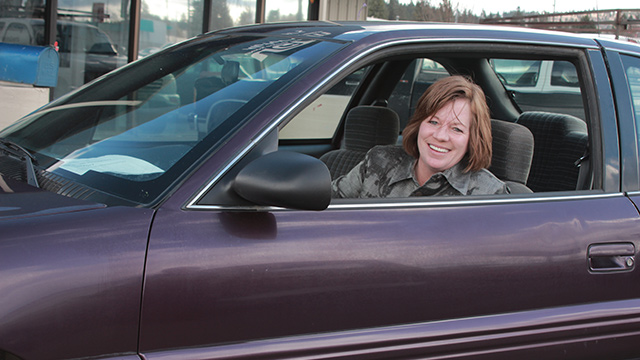 Woman in her car