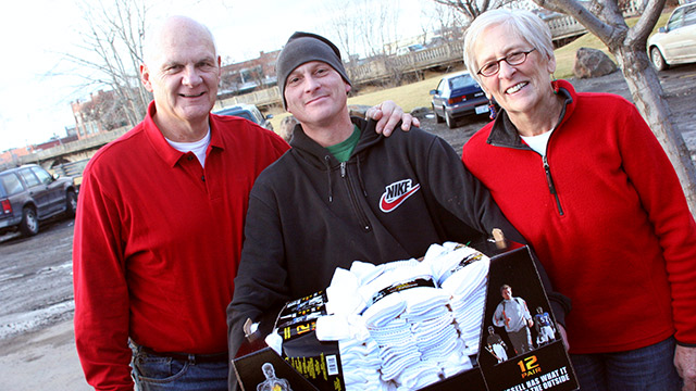 couple donating box of socks