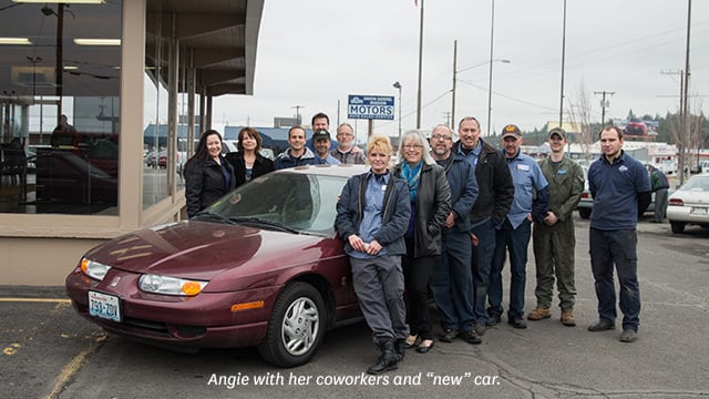 Angie with her coworkers and new car