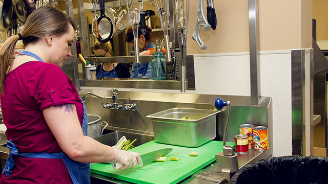 Woman doing kitchen chores