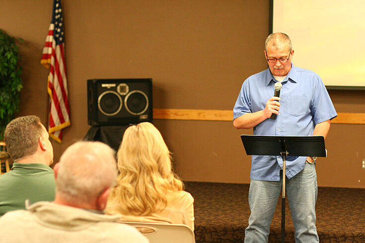 Brent Watts talks to UGM recovery participants