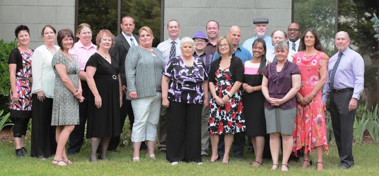 The UGM 2013 Graduating Class from left to right: Kari Reese, UGM Women's Recovery Director, Dawn Staggs, Tammy Salmon, Trinity McLaughlin, Deborah Paine, Sean Hulsey, Angie Best, Dean Brewer, Marilyn Nebeker, John Moore, Dustin Eakle, Rebecca Bender, Todd Kennedy, Lisa Phinney, Bill Fleming, Jeff Cooper, Jaymie Clark, Sheldon Nevens, Kathy Keller and Jerry Reese, UGM Men's Recovery Director. group shot cropped