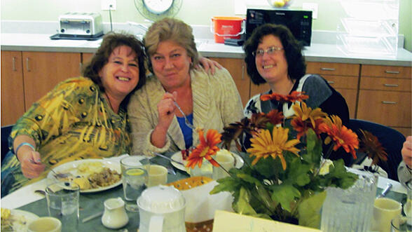 Julie dining with friends