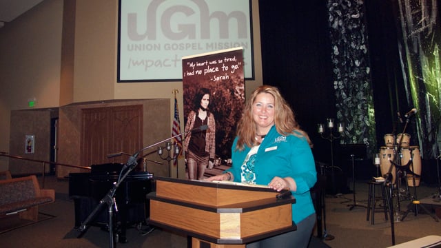 Jackie speaking at church