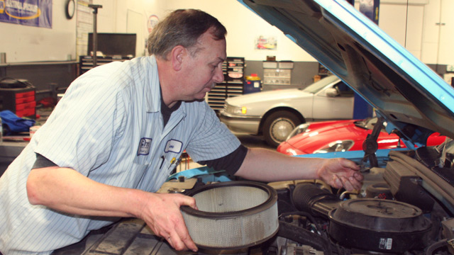 Mechanic working on a car