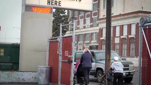 Women leaving shelter gates