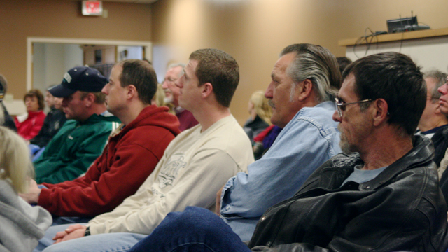 Men sitting in on Community Meeting