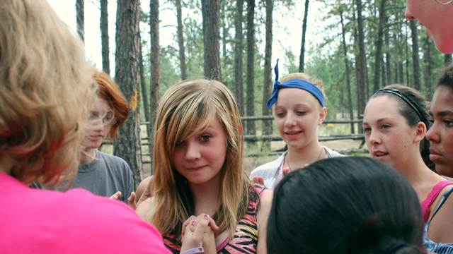 Camp girls doing trust game