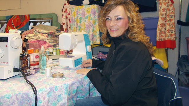 Glenda at the sewing machine