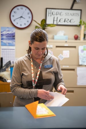 Jenny volunteers and trains other volunteers to work at the Crisis Shelter for Women and Children. 