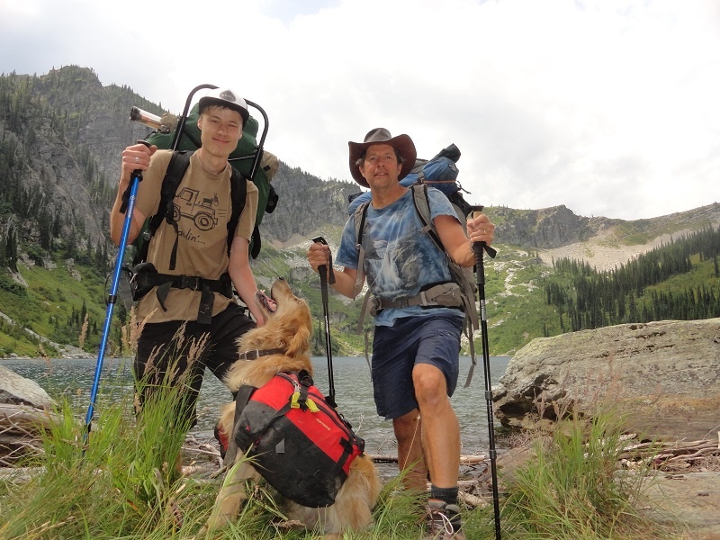 UGM Director of Volunteers Greg Barclay enjoys a backpacking trip with his son, Cameron, and dog Ransom.