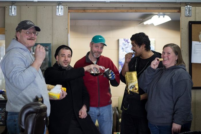 Sometimes the warehouse workers get a few goodies while they work to feed the hungry at UGM.