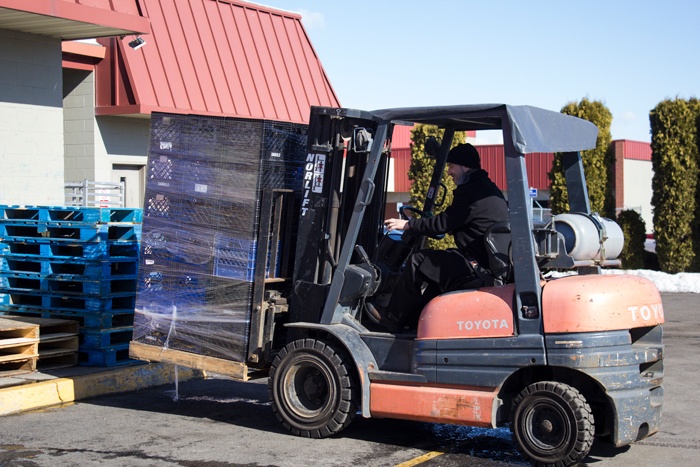 Driving the forklift is just one piece of what it takes to feed the hungry at UGM.