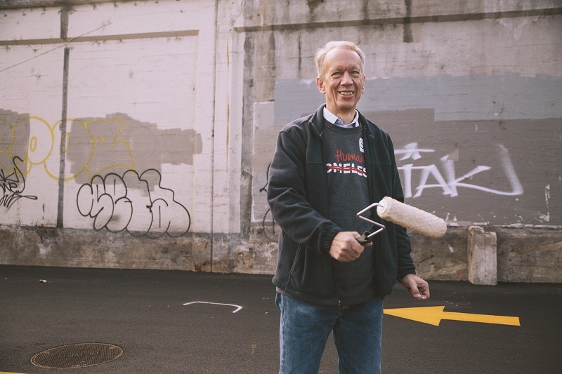 Jim Illback served among other volunteers on World Homeless Day, and regularly serves at UGM to help the homeless.