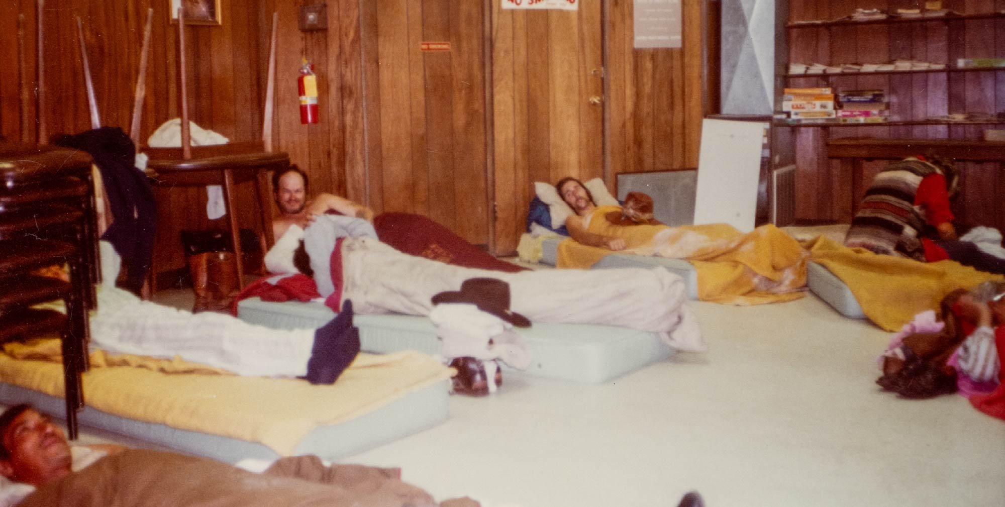 Men sleeping on the floor