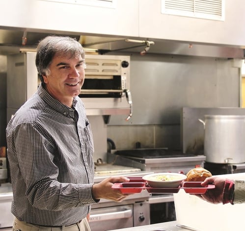 Phil serving lunch small-1