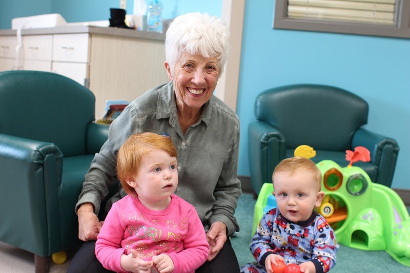 Ronnie volunteers in UGM child care. Her partnership gives moms a chance to go to recovery classes and job training.