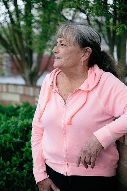 Ann standing outside Anna Ogden Hall