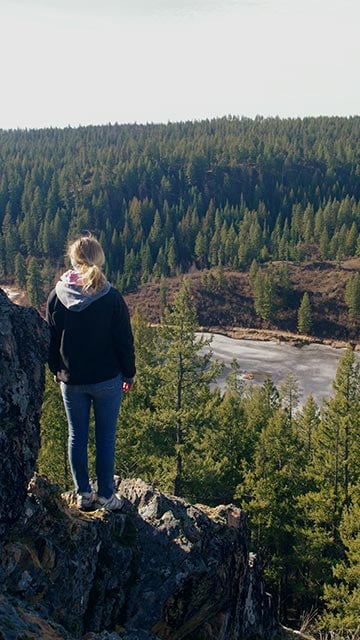 Merrily overlooking a cliff